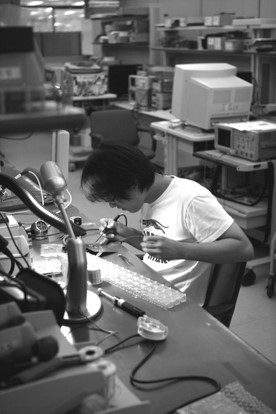 Professor Jaewon Nam conducting circuit measurements
